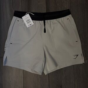 Gymshark Men's Light Gray Athletic Shorts with Black Accents